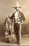 By 1900, the tall, conical and very pointed crown has become common and standard.