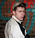 Image 47British "Chav" wearing tracksuit and baseball cap. (from 2000s in fashion)