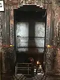 Unified shadow cast on the Shiva lingam