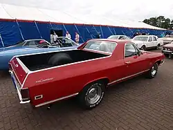 The back half of a Chevrolet El Camino, a pickup truck whose bed smoothly curves into the cabin