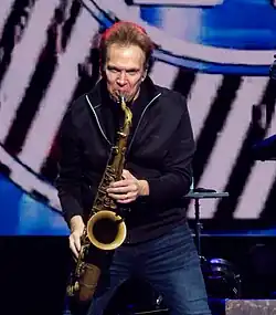 Ray Herrmann on stage with Chicago, 2024