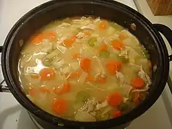 Homemade chicken noodle soup cooking