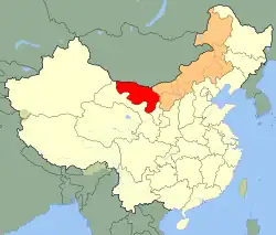 Map of China with Inner Mongolia highlighted in orange except Alxa League, where the desert is located, highlighted in red.