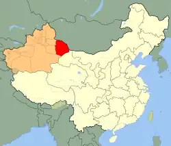 Hami prefecture (red), location of the Kumul Khanate, in Xinjiang (orange) (modern borders shown)