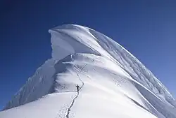 Giant cornice on top of the Chopicalqui at 6,345 m (20,817 ft) in the Andes in Peru