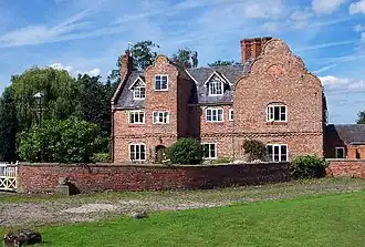 Brick house with shaped gables
