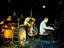 Abrahams (right) performing with James Waples and Mike Majkowski