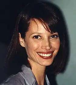 Christy Turlington in 2000, wearing a gray shirt
