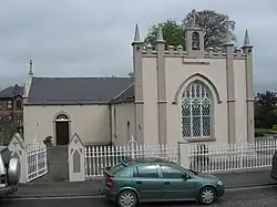 Tallanstown's 18th-century church was extended and a Gothic frontispiece added c. 1830
