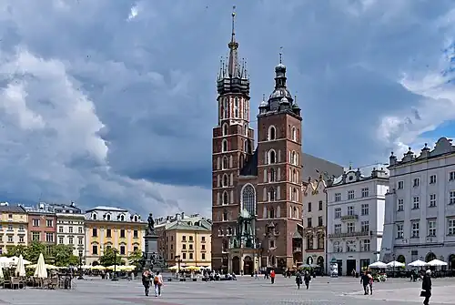 Northeast corner of the square. Adam Mickiewicz Monument and St. Mary's Church.