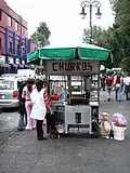 Churro Stands, like this one in Coyoacán, Mexico City, are a common sight in Latin-America.