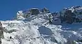 Summit of Cima Falkner centered in back with Cima Grostè to left