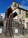 A grave with a ladder to climb on.