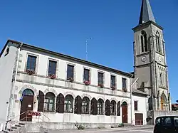 The town hall, school and church in Clézentaine