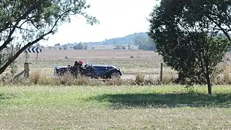 Classic car rally passing through North Branch on Gunbower Road, 2015