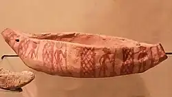 Clay model boat with depictions of oarsmen. Naqada grave 566. Naqada Naqada IId1 (ca. 3400 BC). Ashmolean Museum, AN 1895.609.[107][108]
