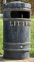 A cylindrical litter bin in Chatham, Kent, England