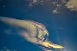Vibrant cloud iridescence captured before sunset