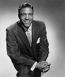 Black and white picture of Clyde McPhatter sitting down