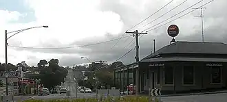 Corner of Napier and Peel Street. The Post Office is on the left and the Black Hill Hotel on the right.