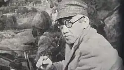 Foujita in military uniform with other Army Art Association members