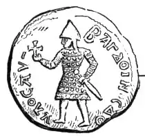 A rude coin depicting a man wearing armour and holding a sword