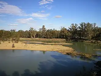 The Murray River flows through Colignan. This island, commonly known as Watts's or Colignan Island, is fully submerged when the river is high