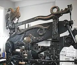 Museum of Lincolnshire Life, showing the eagle, the dolphins, the maker's plate with its cartouche, and an Acanthus leaf