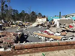 Image 25EF3 damage to a grocery store in Columbus, Mississippi. One person was killed at this location. (from Tornadoes of 2019)