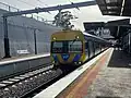 A Comeng train on a Flinders Street-bound service arrives at Platform 1, June 2022