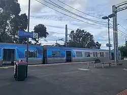 A 6-car Alstom Comeng led by 561M at Werribee station preparing to run a city-bound Flinders Street service