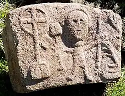 Bas relief with effigy, in Comiac