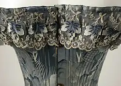 Closeup of lace details on an American corset circa 1878