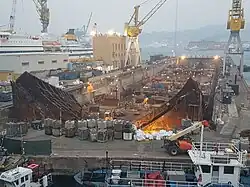 The wreck in its final stage of demolition in drydock No. 4 Genoa, 10 January 2017