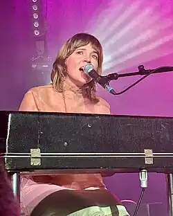 Andrews performing at Band on the Wall in Manchester, England, 2023