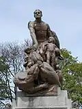 Bronze group atop the memorial