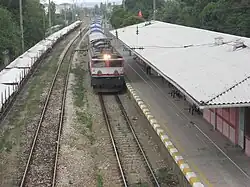 The eastbound train passing Tuzla station.