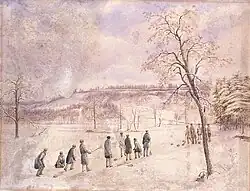 group of people on the ice of a pond