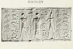 Cylinder seal with a cartouche possibly reading "Khamudi".[1]