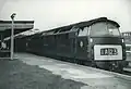 Western Courier in maroon livery