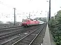 120 502 leaves Köln Hbf on a Bahntechnik train.