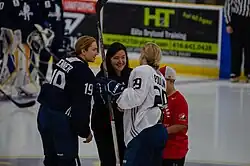 Jenner (left) with Marie-Philip Poulin during the Toronto Dream Gap Tour, 2019