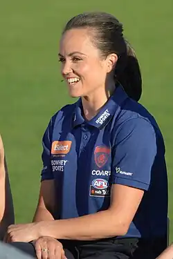 Pearce sitting at a desk