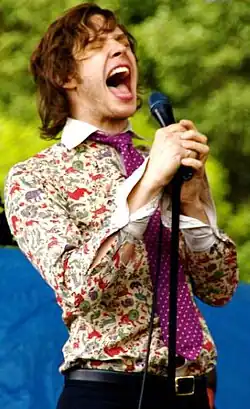 Image 18Indie rock singer Damian Kulash wearing psychedelic 1960s-inspired clothing, 2006 (from 2000s in fashion)