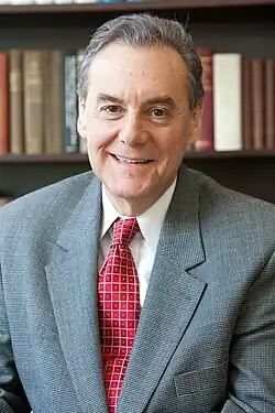 Smiling older man in suit