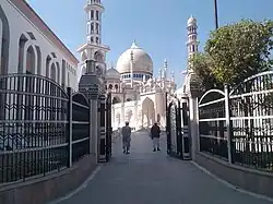 A view of the mosque through a gate