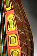 Zanfirico cane next to a murrine pattern