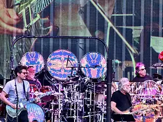 Dead & Company at Folsom Field in Boulder, Colorado, in June 2017. Left to right: John Mayer, Bill Kreutzmann, Bob Weir, Mickey Hart. Not pictured: Oteil Burbridge and Jeff Chimenti.