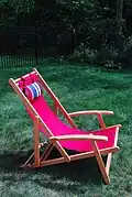 Deckchair with armrests and padded head rest