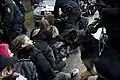 Protesters sitting down during a demonstration